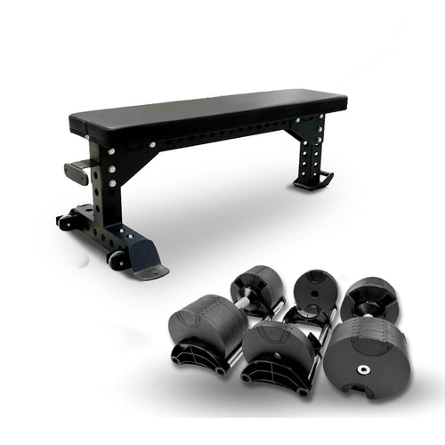 Adjustable dumbbells with weight plates and a flat bench. The bench is black and the dumbbells have metal handles.