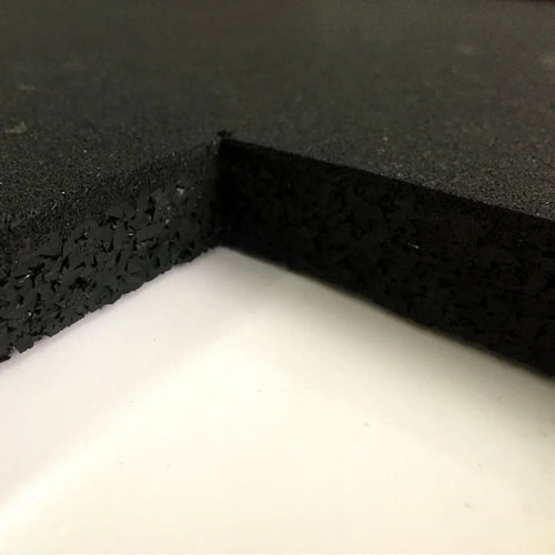 Close-up view of a black rubber gym mat